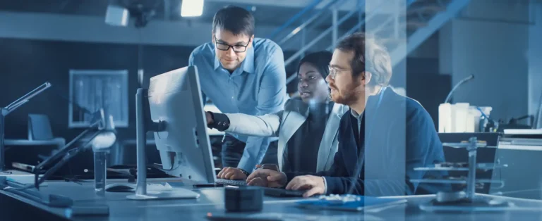 Development Team Working on Computer